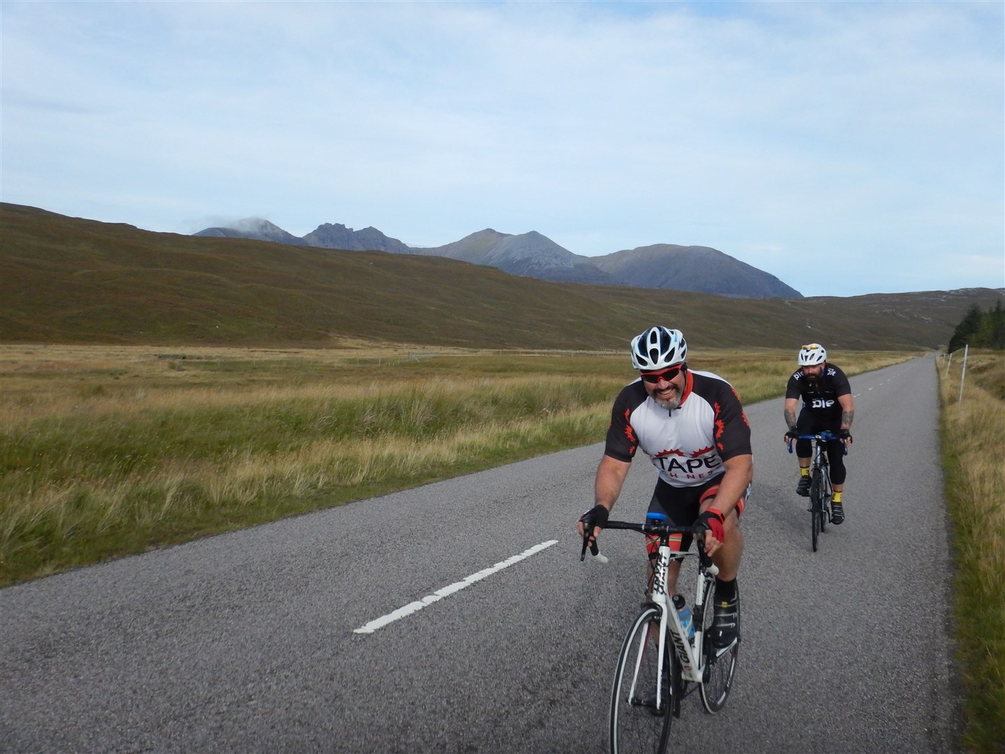 On the destitution road with An Teallach in the background.