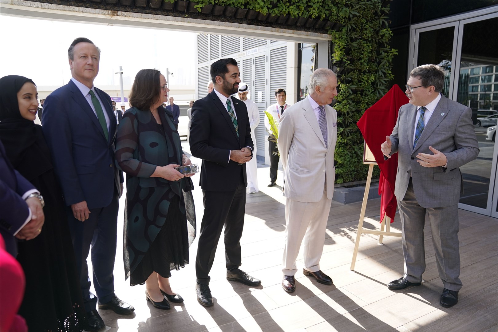 The King spoke with Foreign Secretary Lord Cameron, Scotland First Minister Humza Yousaf and staff from the Dubai campus of Heriot-Watt University (Andrew Matthews/PA)
