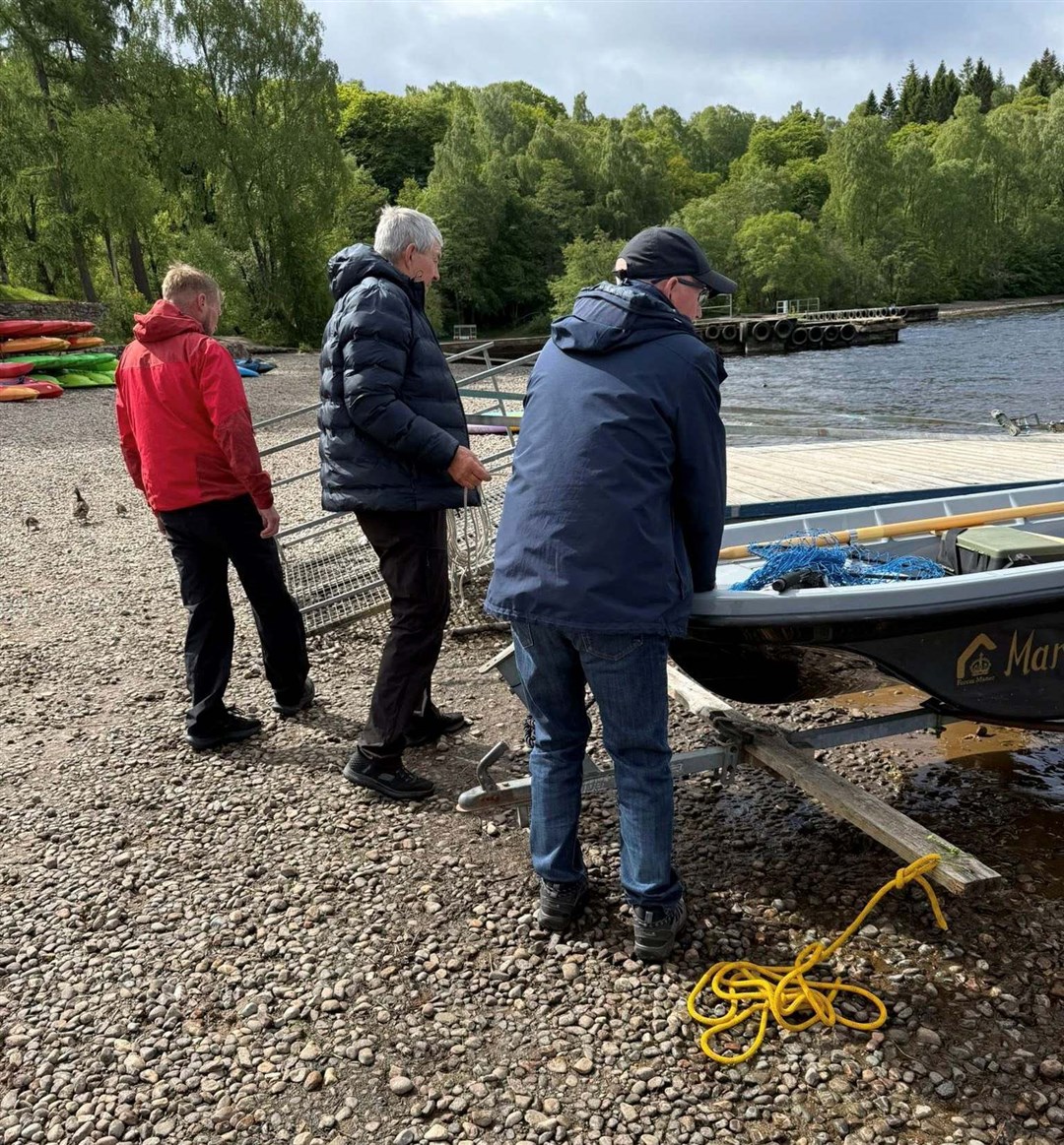AND ALL WHO SAIL IN HER...Help for Tony Brown today from some of those who will be making full use of the memorial boat to the late Marion Ramage. She died in 2001