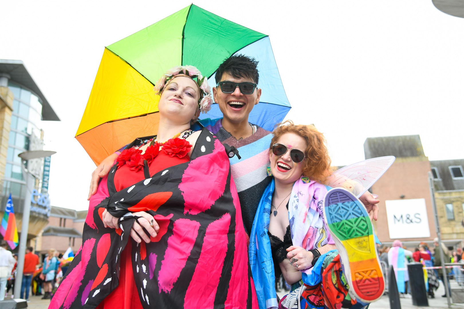 Ellie Gartside, Edwar Mendoza and Olivia McMahon enjoying the atmosphere at Highland Pride 2025. Picture: Daniel Forsyth
