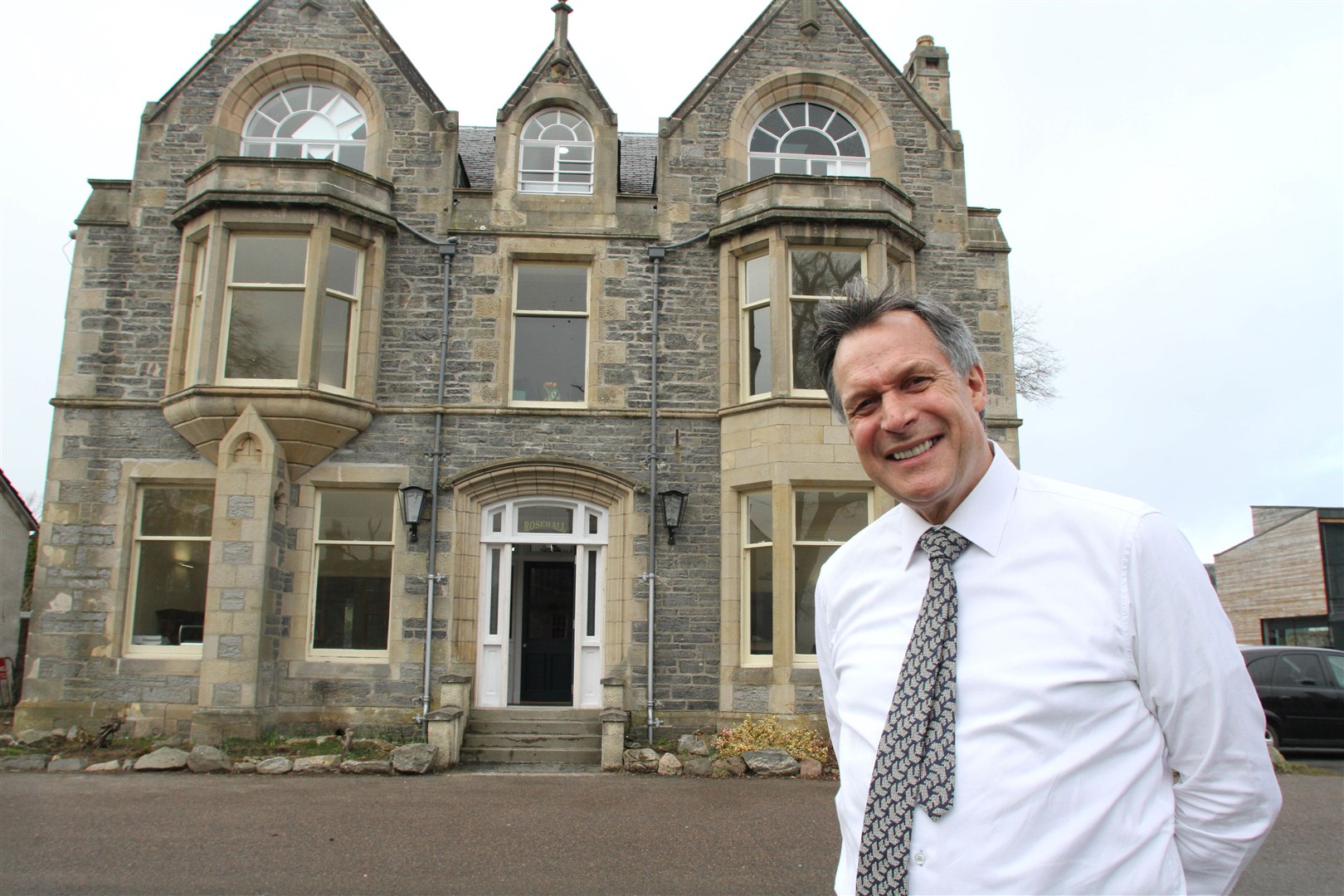 Ron Taylor in front of the company headquarters in Grantown.