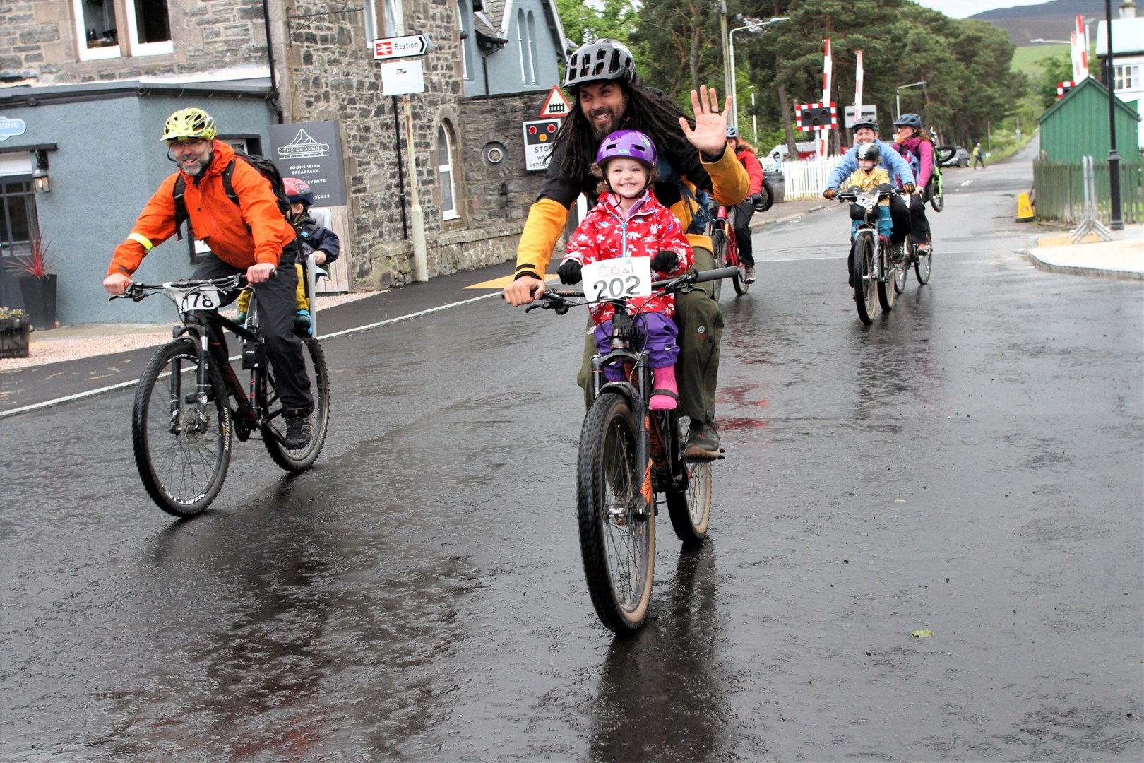 NEVER MIND THE RAIN: All ages took part today despite the weather.