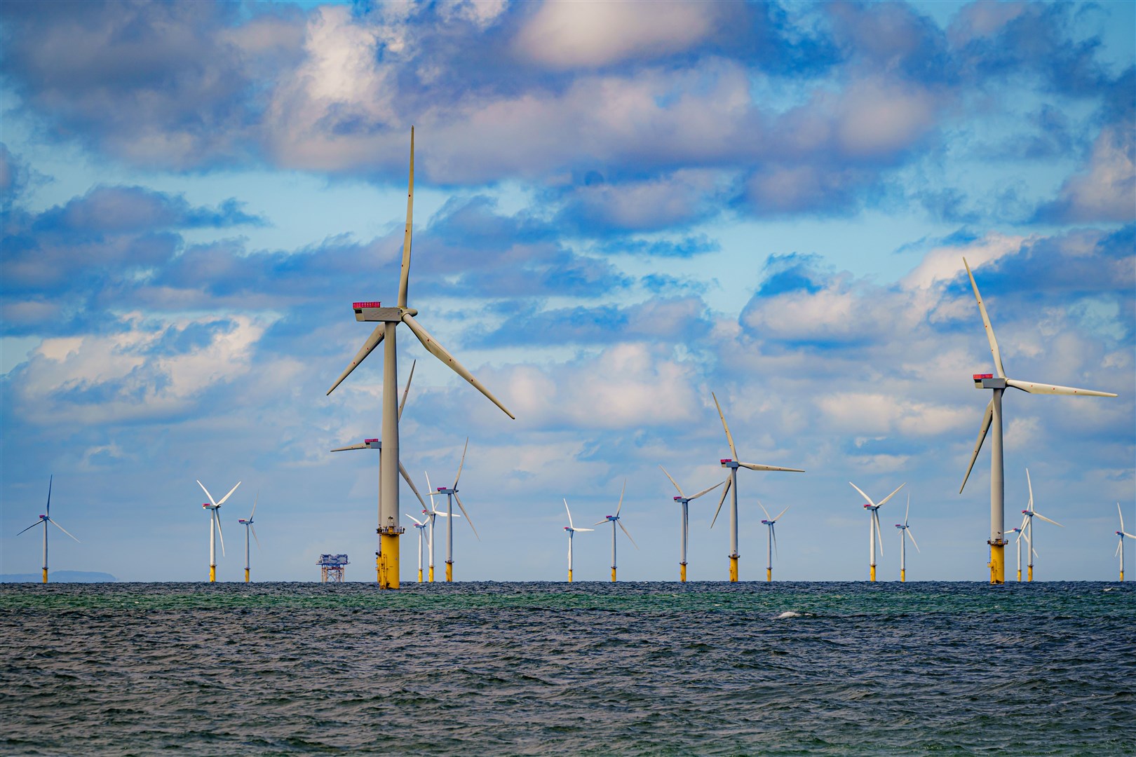 Offshore windfarms are being developed in the UK (Ben Birchall/PA)