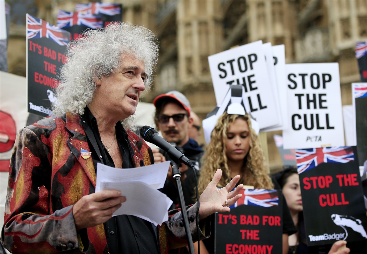 Brian May leads a Team Badger protest march mimicking a funeral parade to mark the killing of more than 2,000 badgers in 2013/14 (Jonathan Brady/PA)
