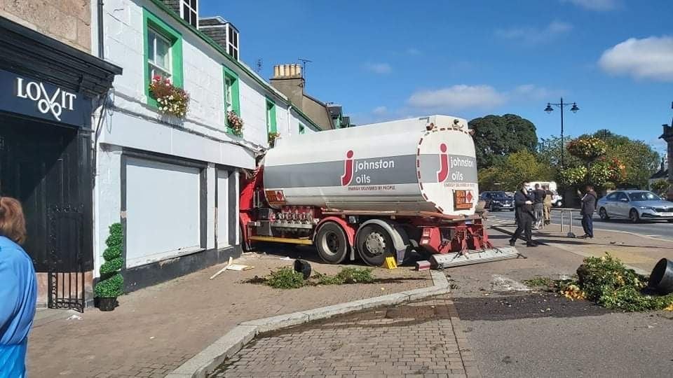 The veichle after it crashed into an unused shop on Beauly High Street.