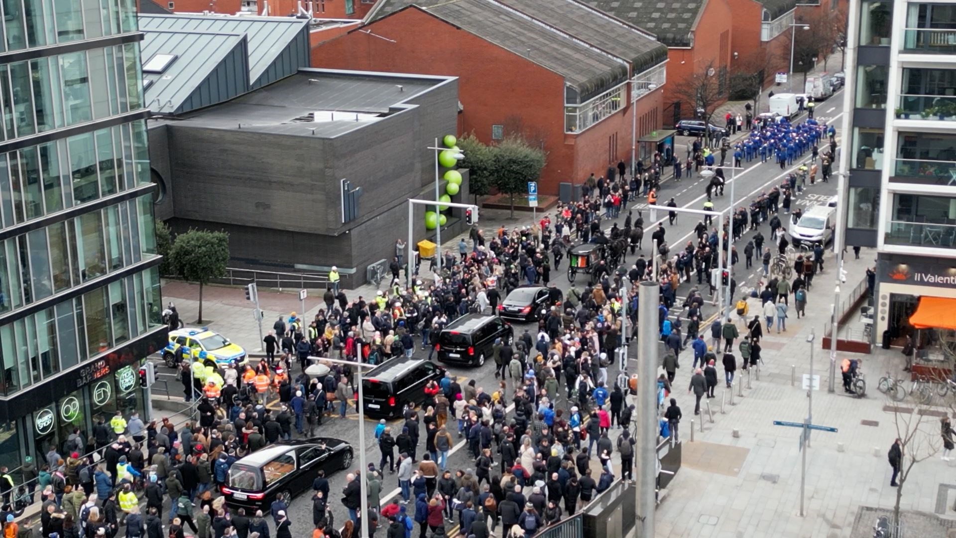 The funeral procession of Shane MacGowan after crossing Mac Mahon Bridge in Dublin (Niall Carson/PA)