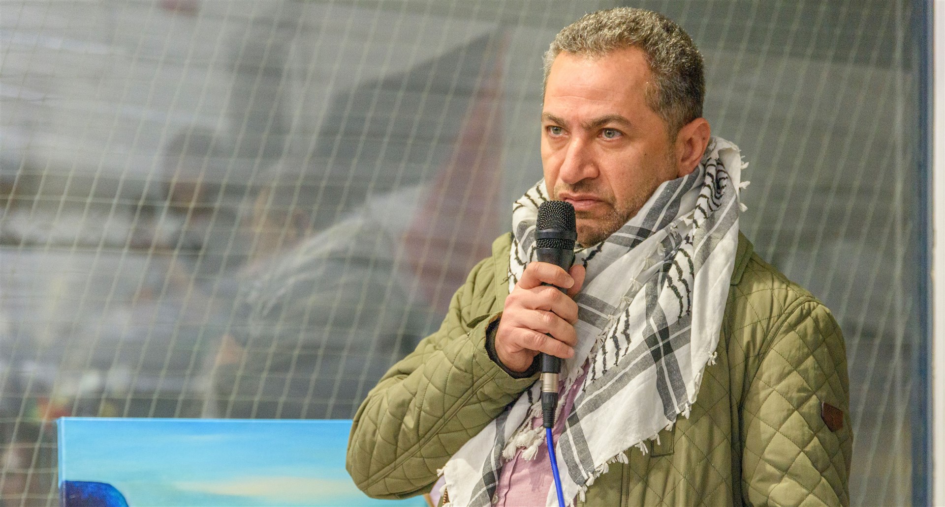 Dr Salim Ghayyada speaks at the event organised by Highland Hearts for Palestine.