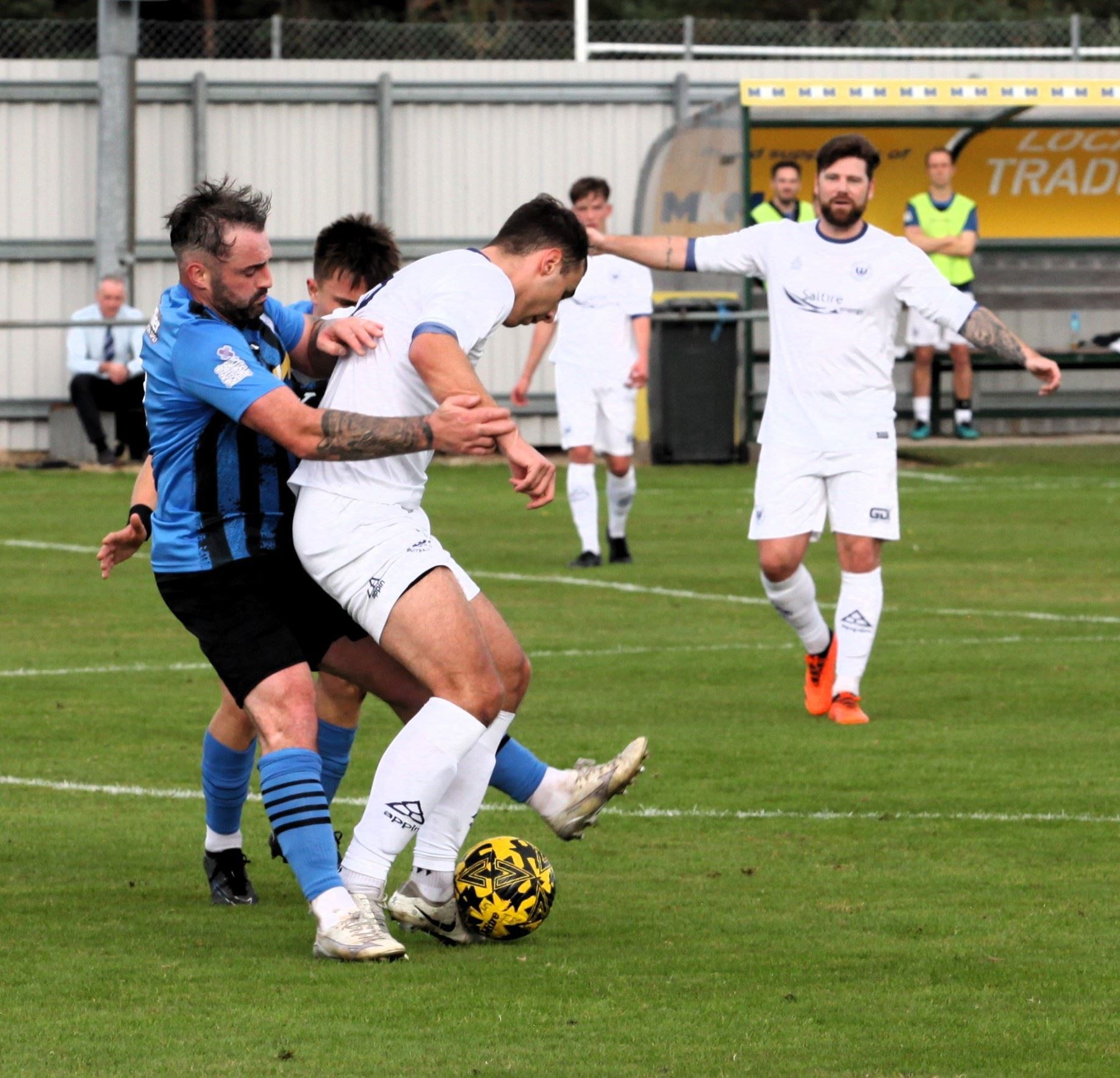 James Lee Fraser (left) in the thick of the action against Banks O'Dee. Pictures: Frances Porter.