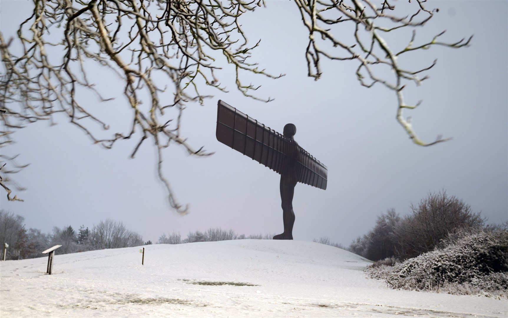 The Angel of the North in Gateshead was also dusted with snow (Owen Humphreys/PA)