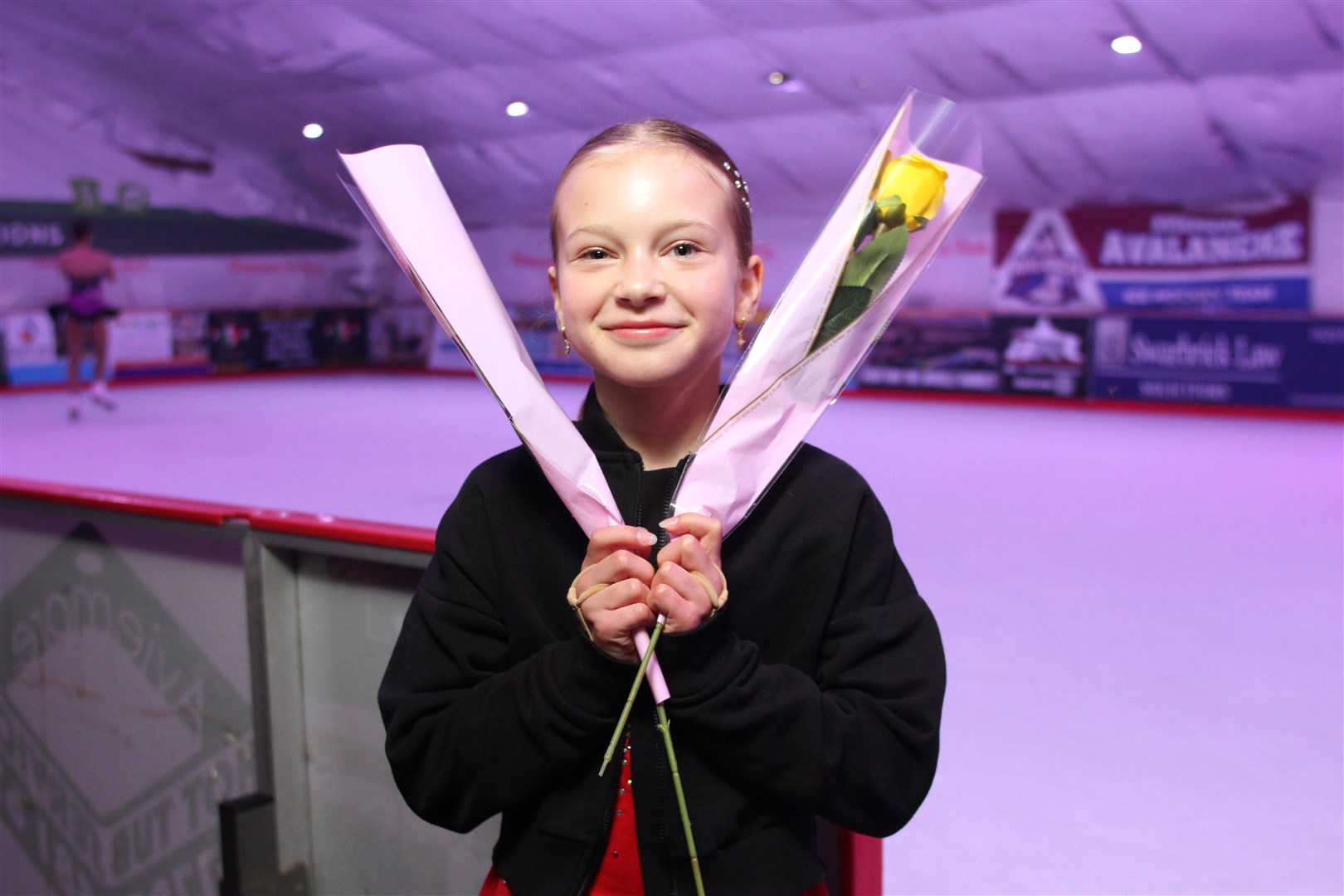 AT RINK: Flowers for Aviemore’s Hanna Drozd.