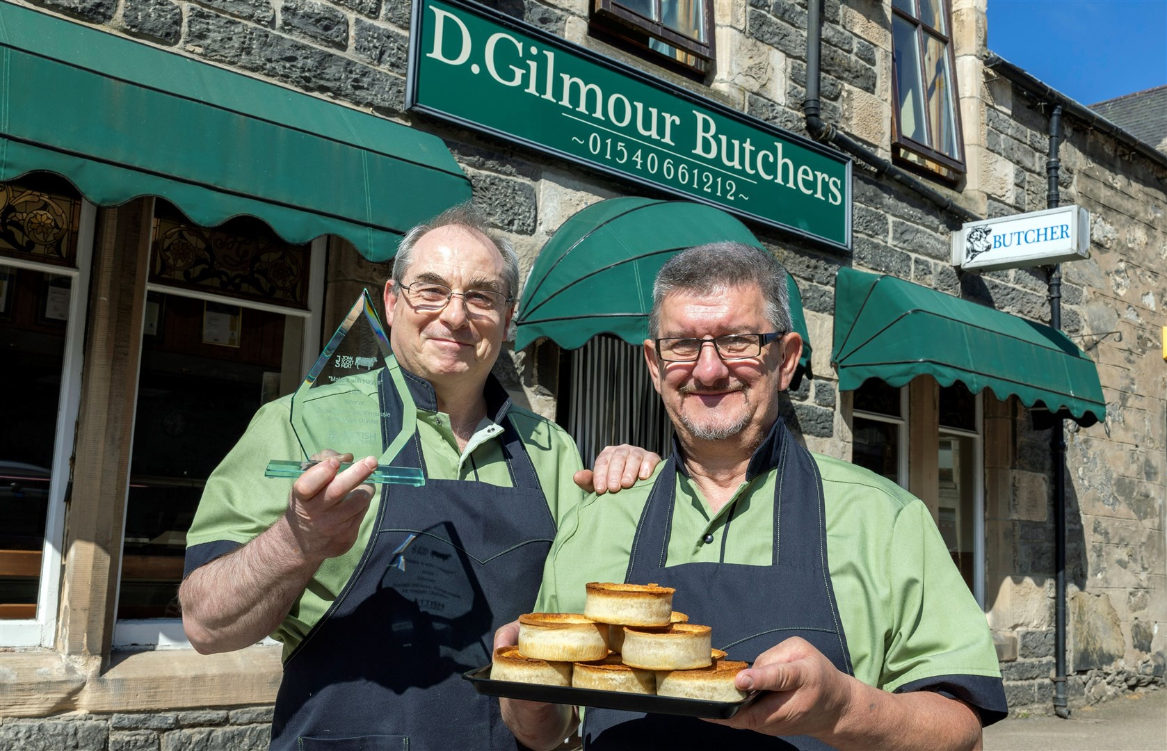 Scottish Craft Butchers Awards Make it with Haggis Champion for 2025 Donald Gilmore (left) pictured with his award winning Haggis Quiche at his butchers shop in Kingussie alongside colleague Willie Conner. (Perthshire Picture Agency)