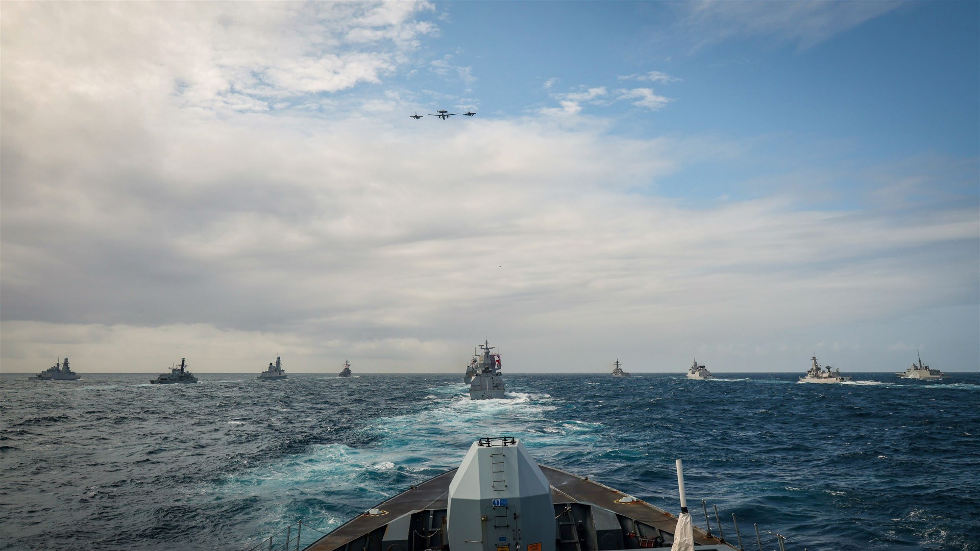 NATO ships form up, including a fly-over by the French Air Force during Formidable Shield 23 in the North Atlantic.