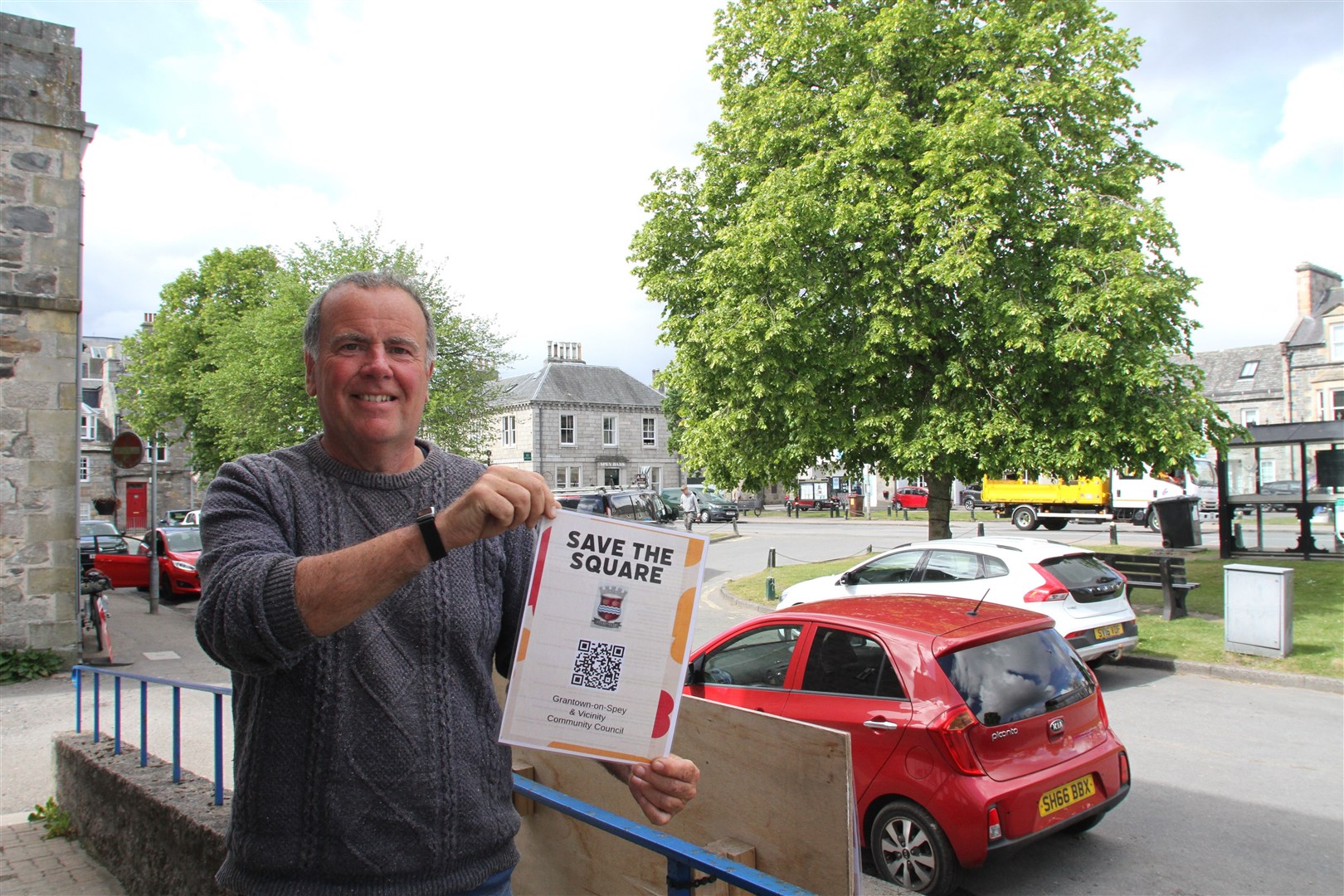 VICTORY: Community Council treasurer John Halliday was first out to celebrate after the news from Inverness.