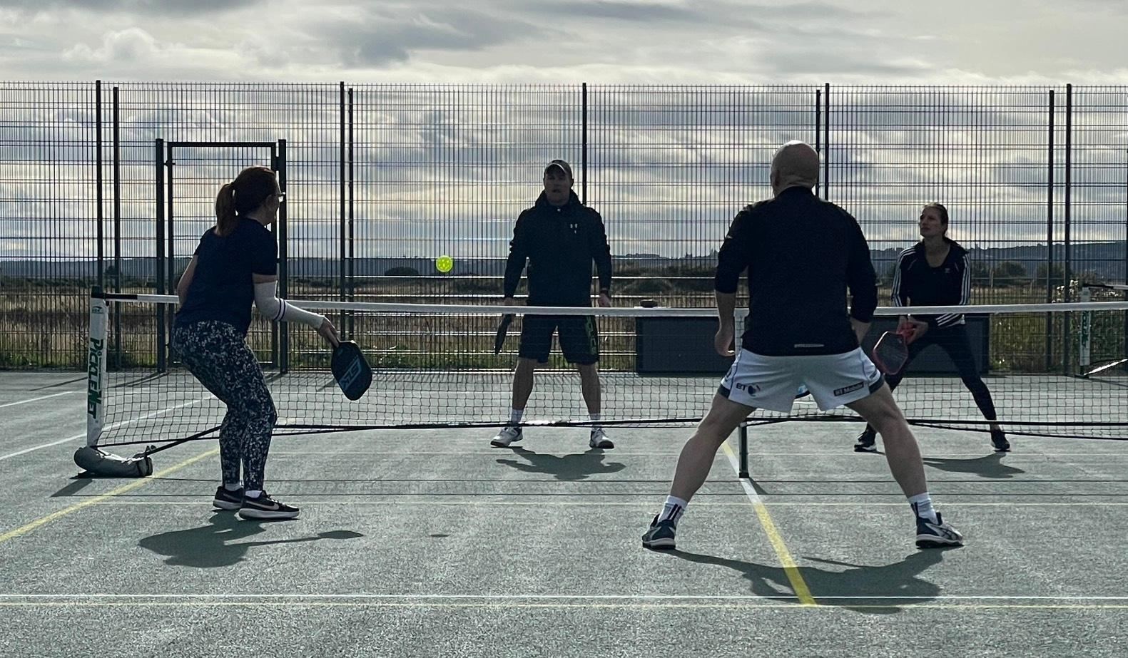 Pickleball Inverness players Liz and Douglas Fletcher in the foreground, and Luke Matheson and Julie Sachot in the background playing at a tournament in Dornoch last year.