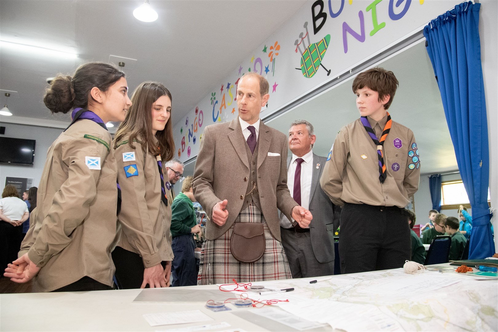 Prince Edward talks to members of the Cairngorm Explorer Scout's about map reading and navigation. Picture: Daniel Forsyth.