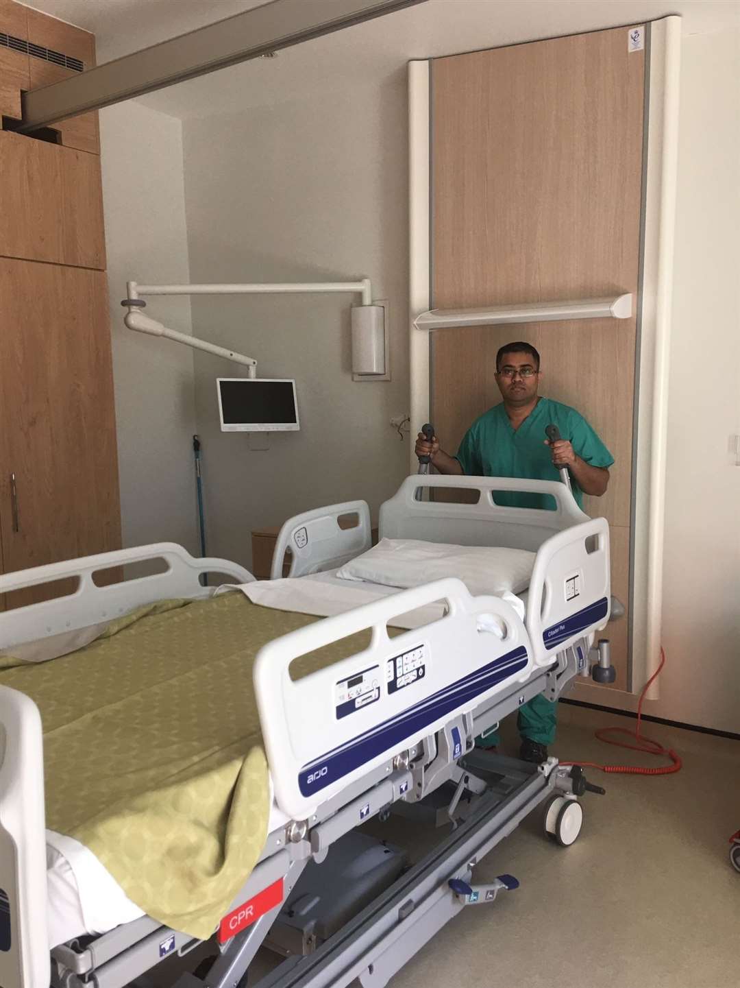Physiotherapist Giridhar Ravi with one of the new beds.