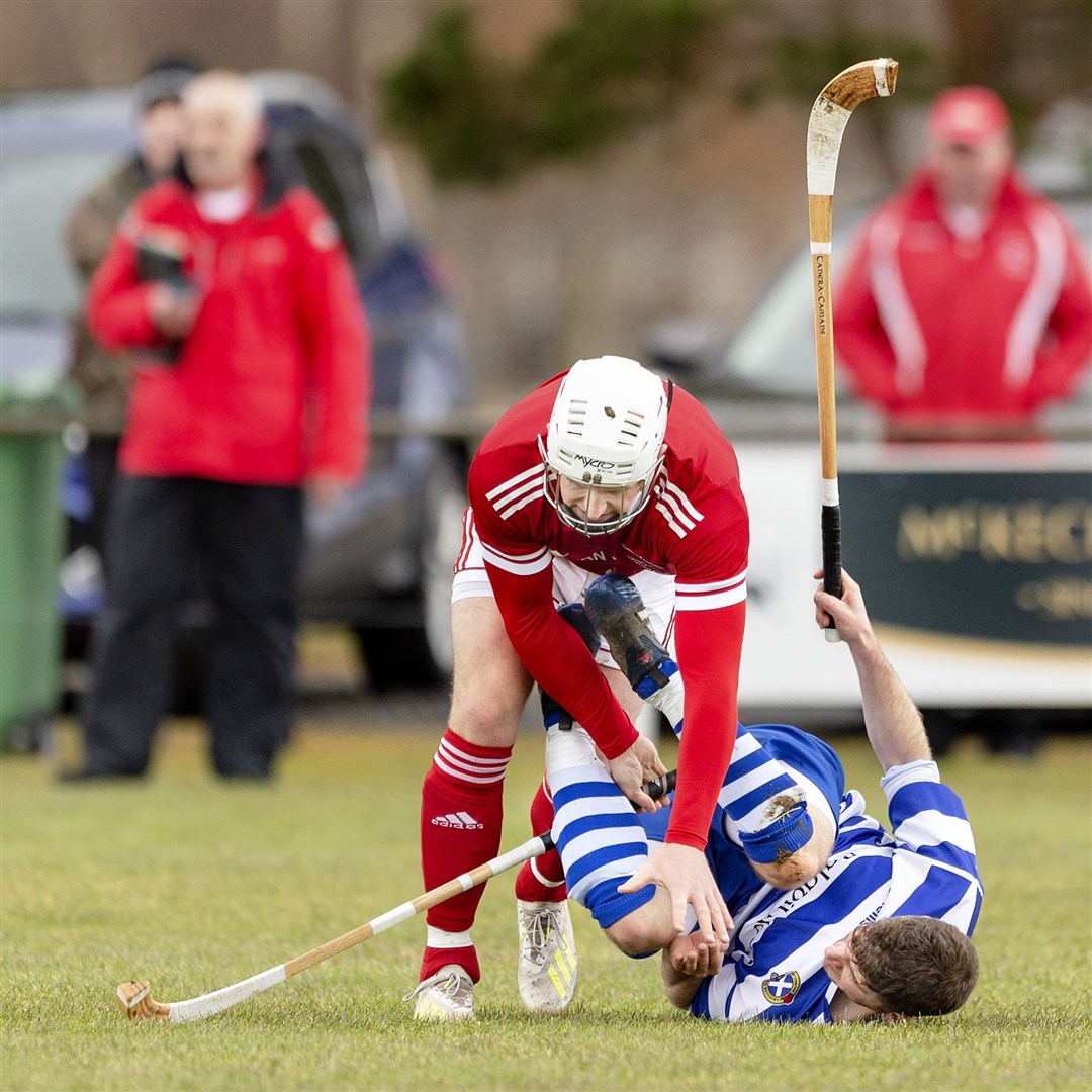 Mark MacDonald (Kinlochshiel) and Drew MacDonald get embroiled in a wrestling match.