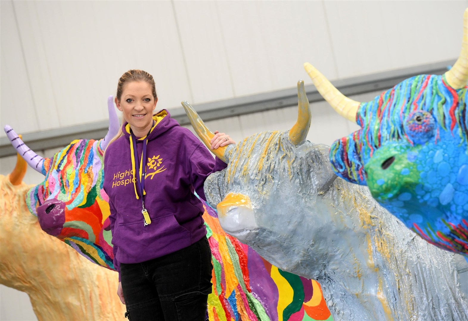 Jenna Hayden with Highland Hospice's coos which are now ready to travel to a variety of sites.