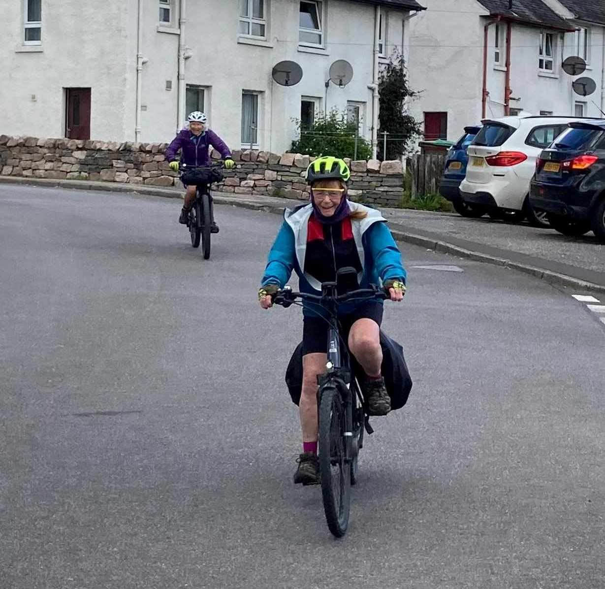 ON YER BIKE: Trish loved every minute of it and had superb support from friends, some of whom turned out for the occasional 'booster'.