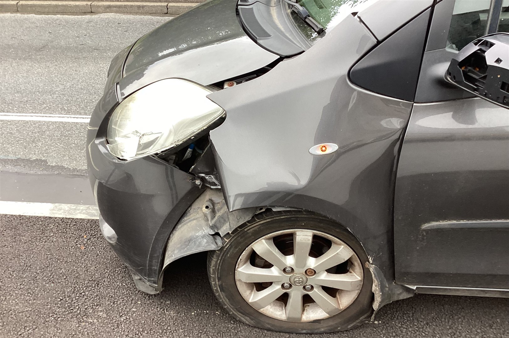 AFTERMATH: A damaged car this week after encountering the build-out.