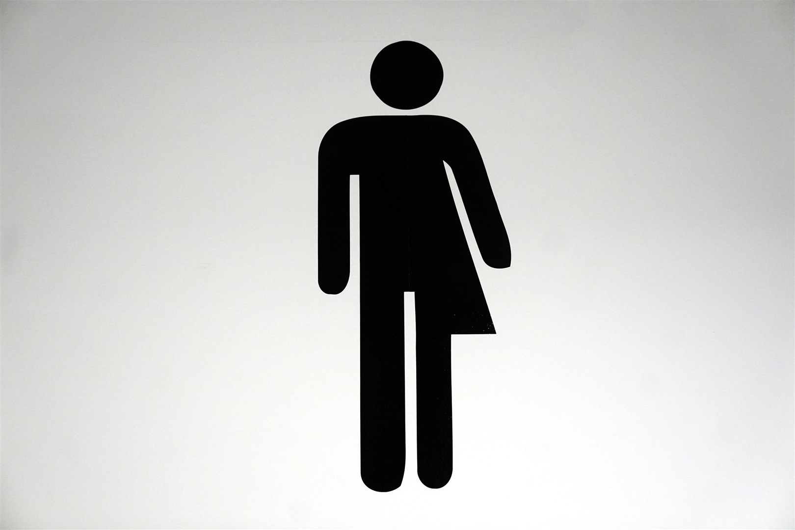 A sign for a unisex non-binary gender neutral toilet (Victoria Jones/PA)