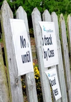 no trespass sign beside the railway track
