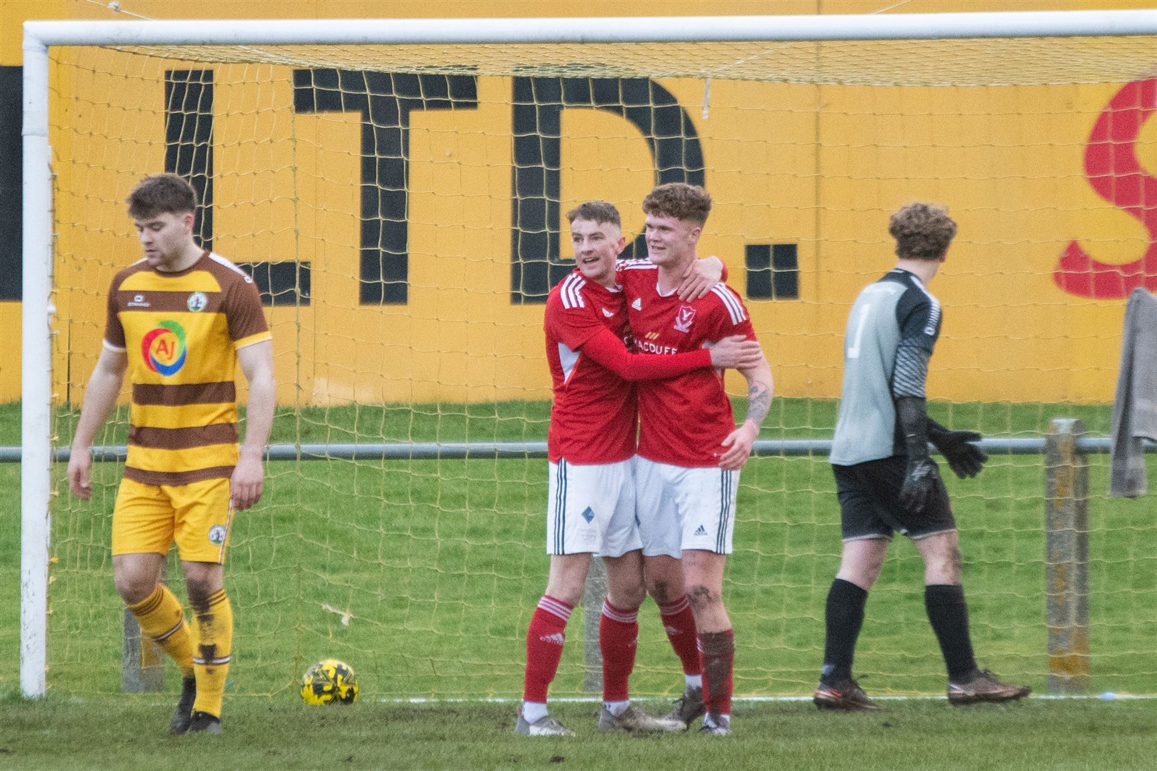 Deveronvale's Scott Thomson embraces goalscorer Ryan Park (right) after his opener in the 2-0 win at Forres. Picture: Daniel Forsyth..