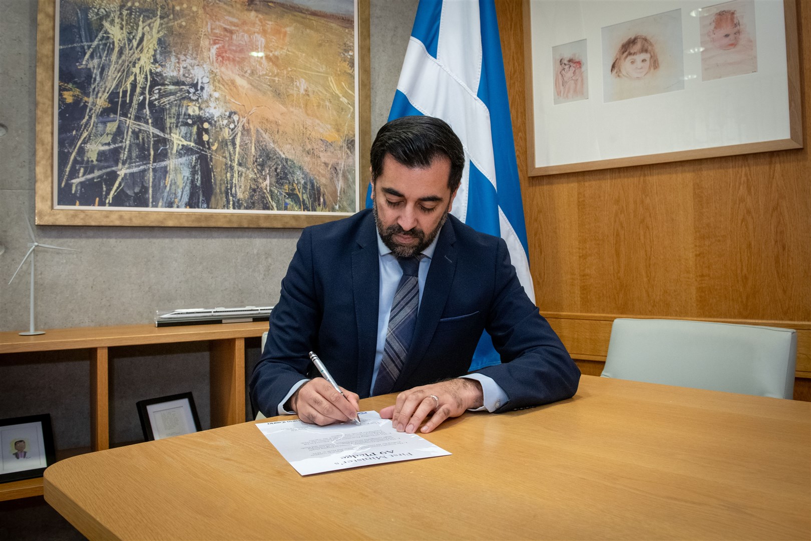First Minister Humza Yousaf signing the A9 Pledge. Picture: Callum Mackay..