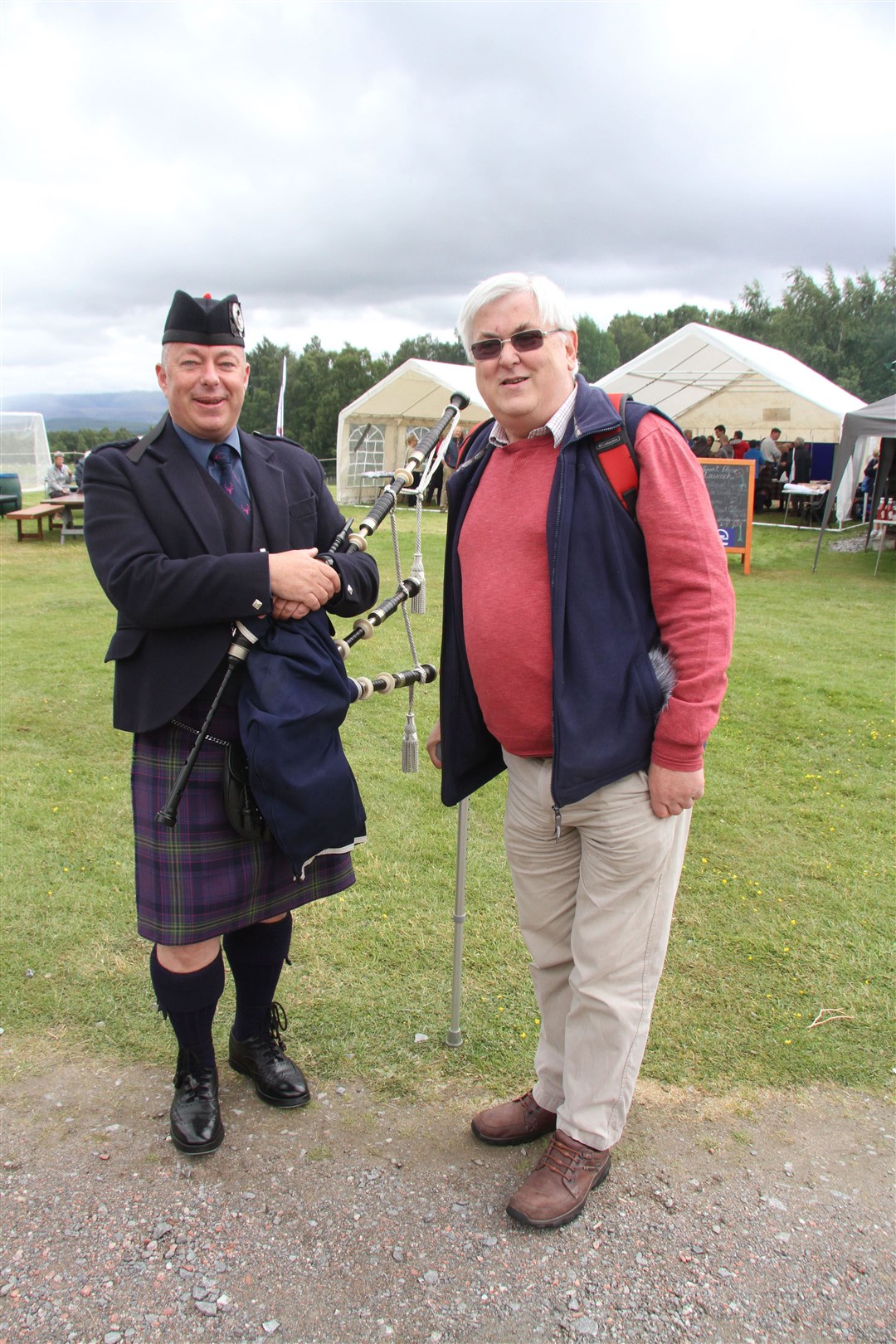 Lewis at work for Speysound, preparing to interview local pipe band leader Chris Thomson at a Badenoch Great Place Project event in 2018 at the Highland Folk Park (Photograph: Frances Porter)