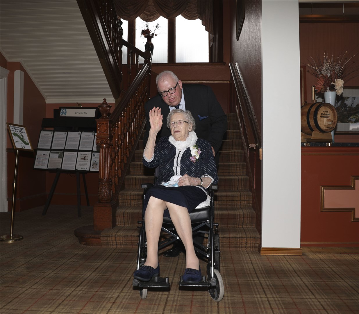 Jessie arrives with her 'chauffeur', son Lindsay, at the Grant Arms Hotel.
