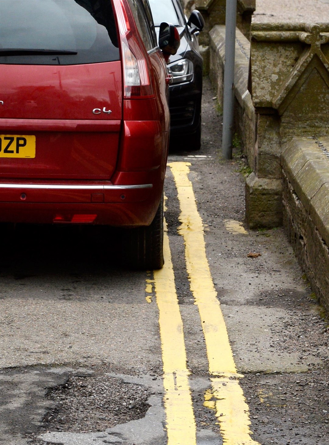 Parking around Rosebank Primary in Nairn just before school bell at 3pm..Side streets are busy with cars on double yellow lines as this one in Queen Street..Picture: Gary Anthony. Image No..
