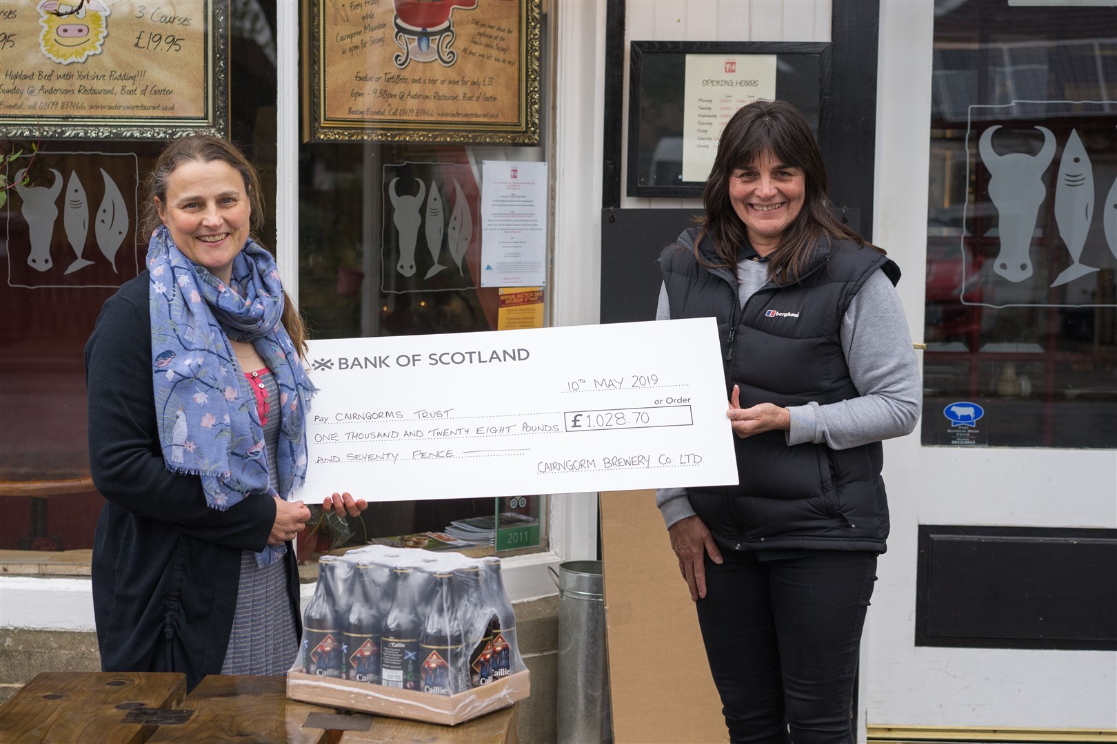 The cheque presentation from Cairngorms Brewery to the trust.