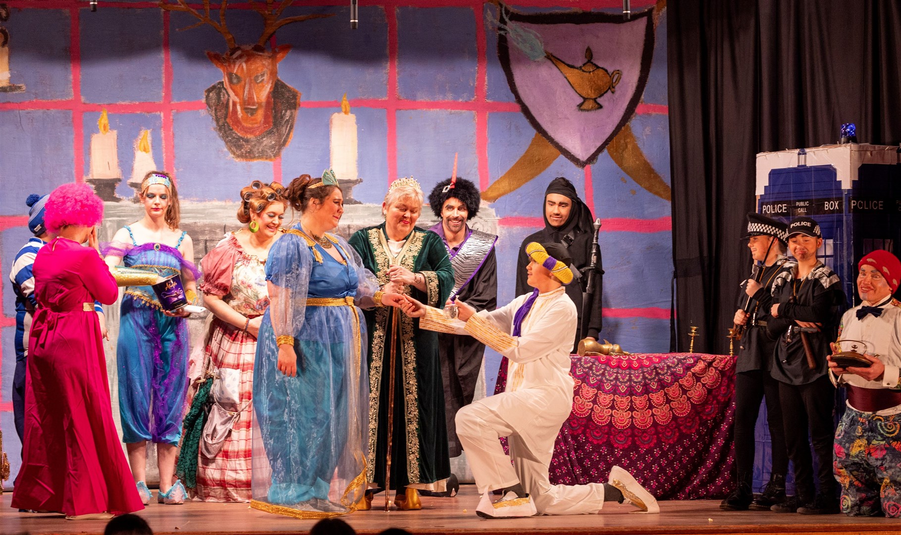 BE MINE! Aladdin (Reuben Lowe) plights his troth with Jasmine (Phoebe Dowens) and all are set to live happily ever after. Also pictured are, from left: Tiger Lily (Helen Fowler), a bit of Wishee Washee (Julie Stewart) the Genie (Megan Vis), Widow Twankee (Meredith Skelton), Lady (Elsie Galt), Abanazer (Michael Dawson), Karate Kid (Tyler Chisholm), Jessica Allan,Tai & Chi (Emelia Fowler) and slave of the ring Eric Dodd. (Aidan Woods)