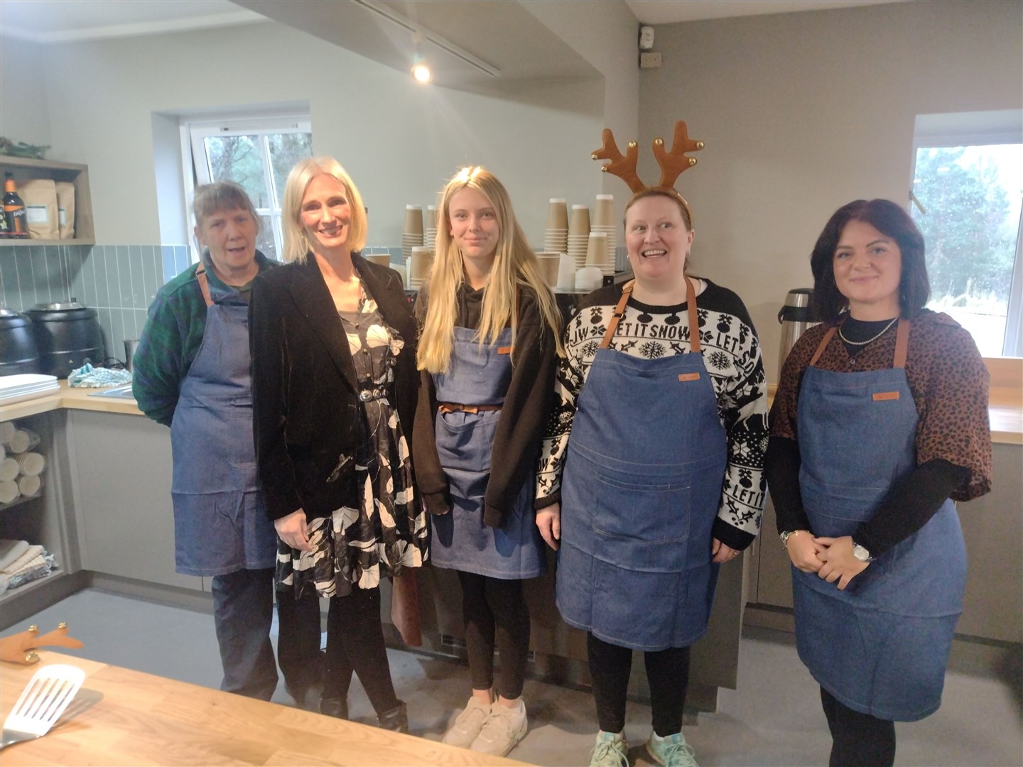 WHAT A TEAM: Welcoming the first crowds to the rejuvenated visitor centre today were, from left, Sheena Sterry, Kirsty Bruce, Alex Bruce, Sarah Monro and Bethan Gunn.