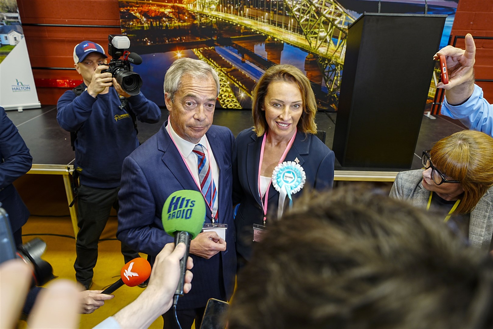 Reform UK’s candidate Sarah Pochin and party leader Nigel Farage speak to the media as they arrive ahead of the result (Peter Byrne/PA)