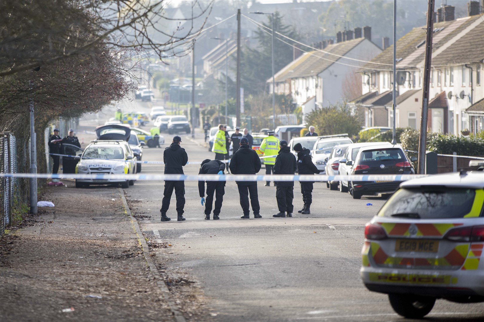 Police search teams in Willingale Road in Loughton, Essex, after the hit-and-run (Rick Findler/PA)