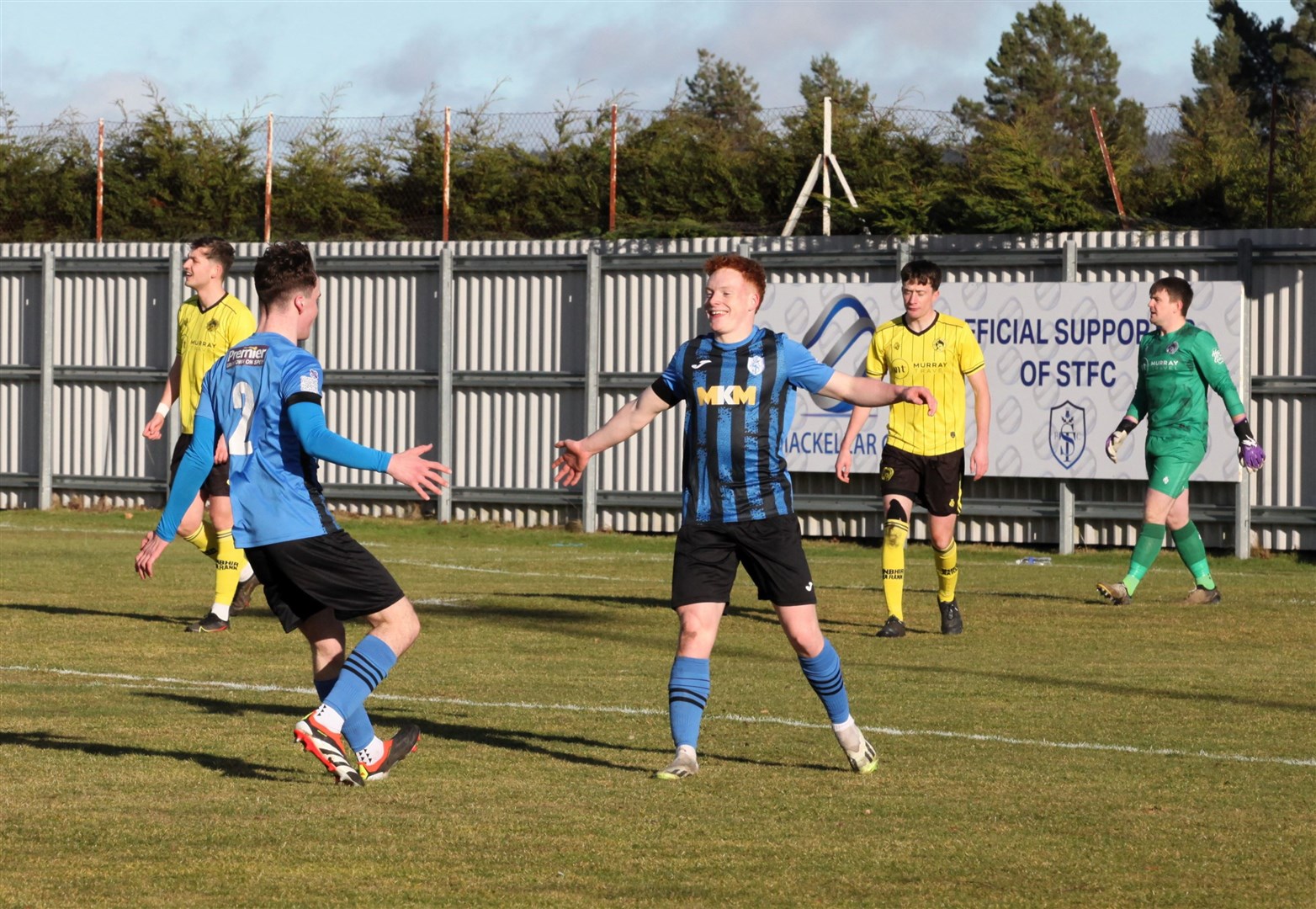 Caelan Mutch celebrates his early goal for Strathspey Thistle against Nairn County.