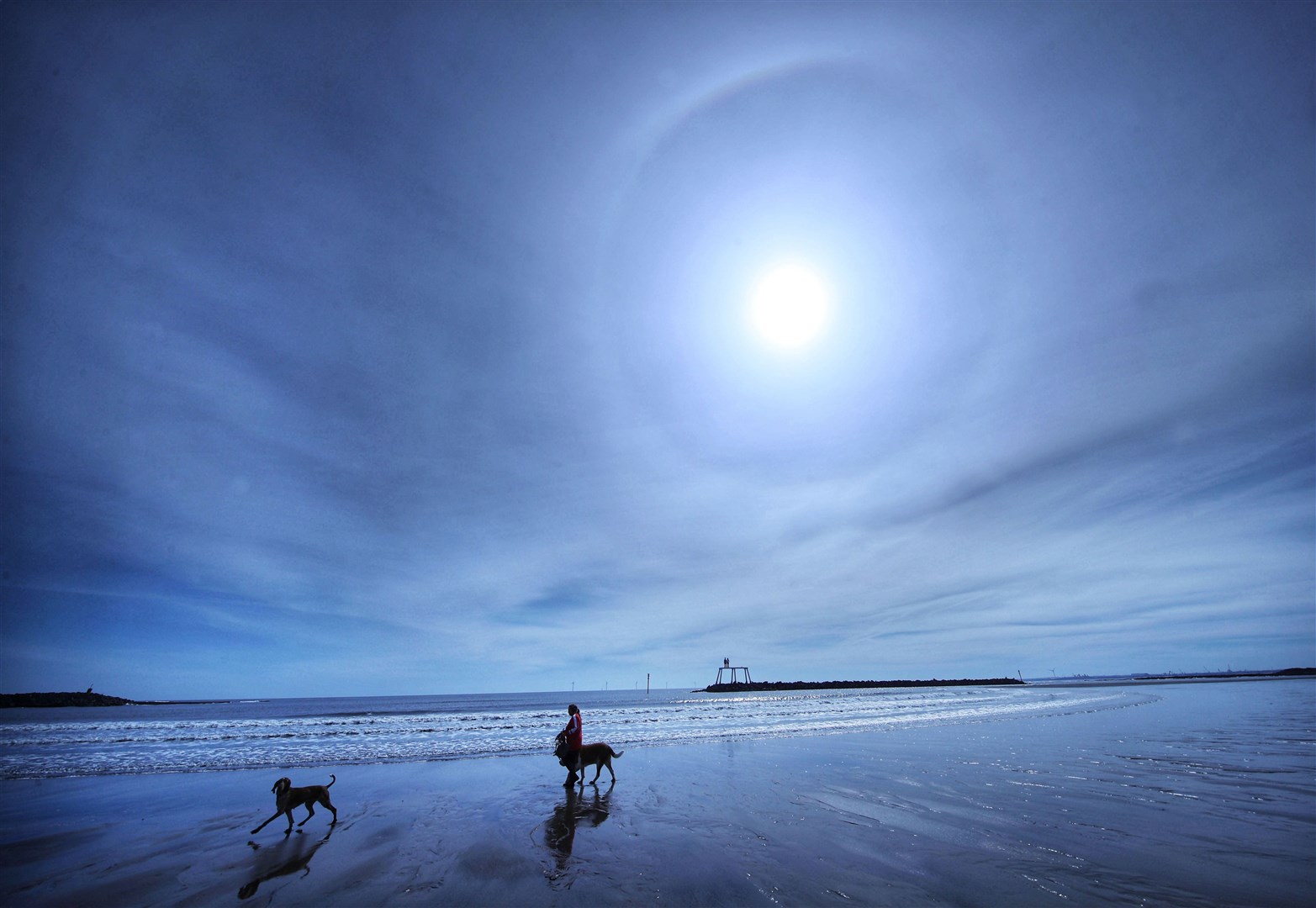 A sun halo appears over the sea off Northumberland (Owen Humphreys/PA)
