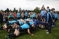 The Scotland forwards practising their scrums as Grantown pupils watch on