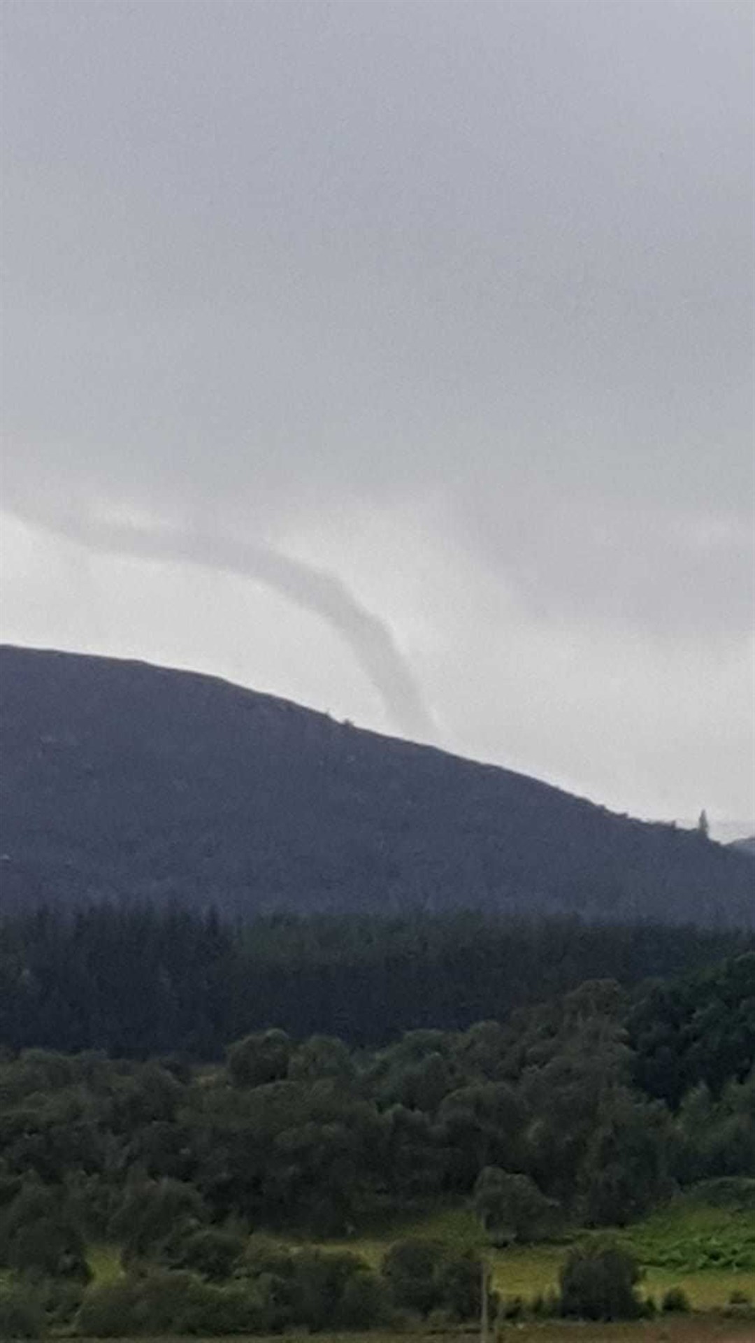 The possible funnel cloud or tornado that Mr Hampton spotted by Kingussie earlier today.