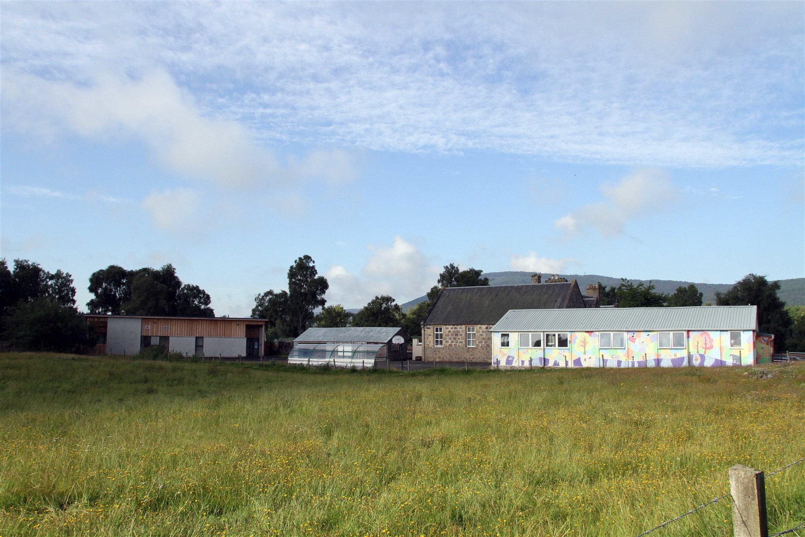 The new nursery at Deshar Primary School (left) funded by the community is one of the places to benefit.