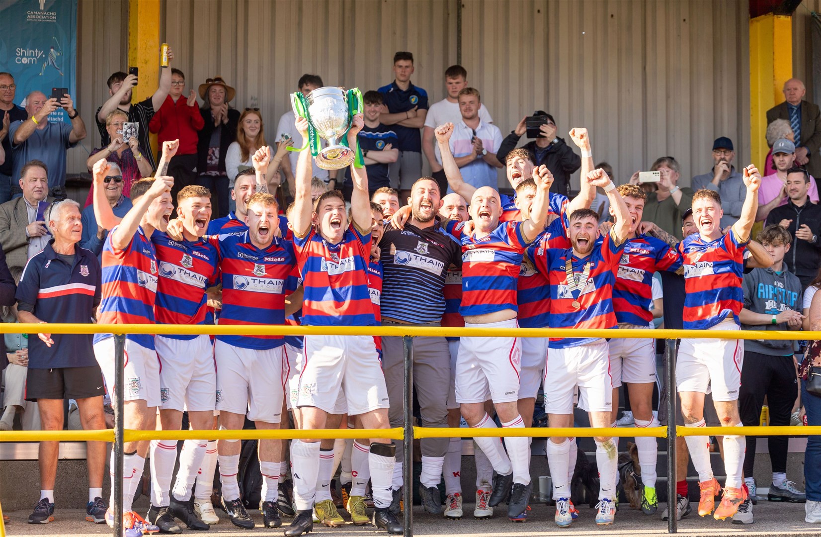 Kingussie lift the Camanachd Cup for the 26th time in their club history. Pictures: Aidan Woods.