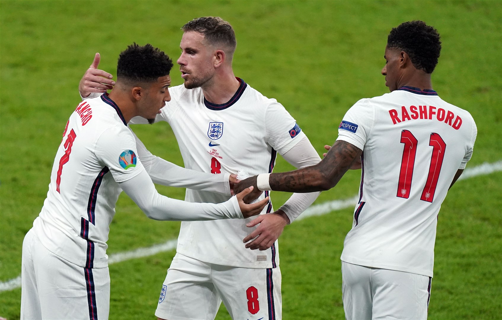 England’s Jadon Sancho, left, and Marcus Rashford, right, suffered racist abuse after missing penalties (PA)