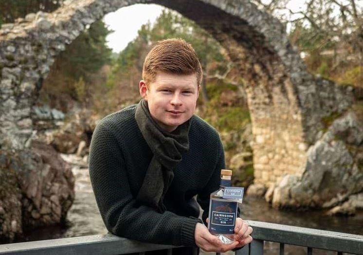 Jack Smith in front of Carrbridge's famous packhorse bridge.