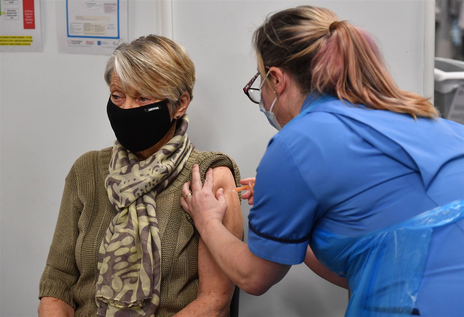 Rita Passey receives an injection of a Covid-19 vaccine at the Millennium Point centre in Birmingham (Jacob King/PA)