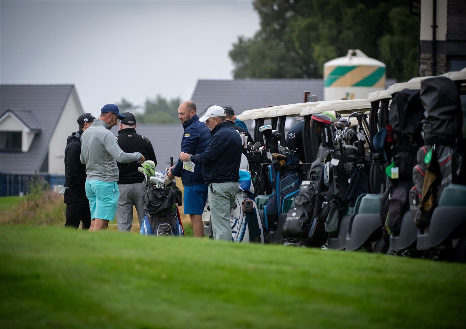 The golf buggies are all ready to go.