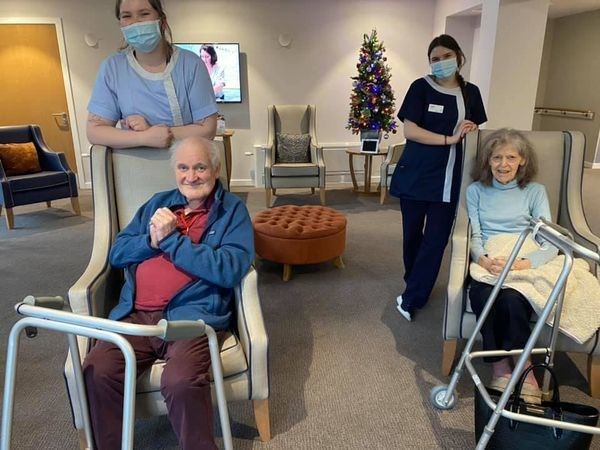 All smiles from residents and staff as they watch on from the care home.