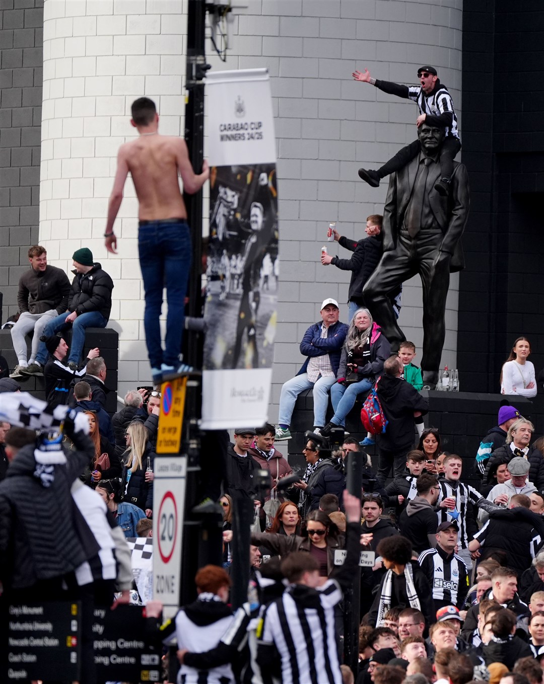 Newcastle United fans outside St James’ Park ahead of the parade (Owen Humphreys/PA)