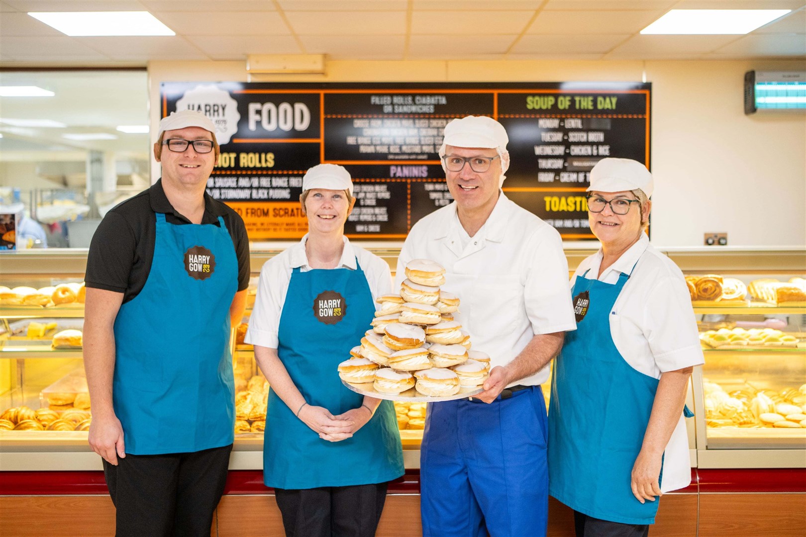 Assistant manager Matthew Curtis, supervisor Sam Hills, director David Gow, and store manager Sarah Musgrove.