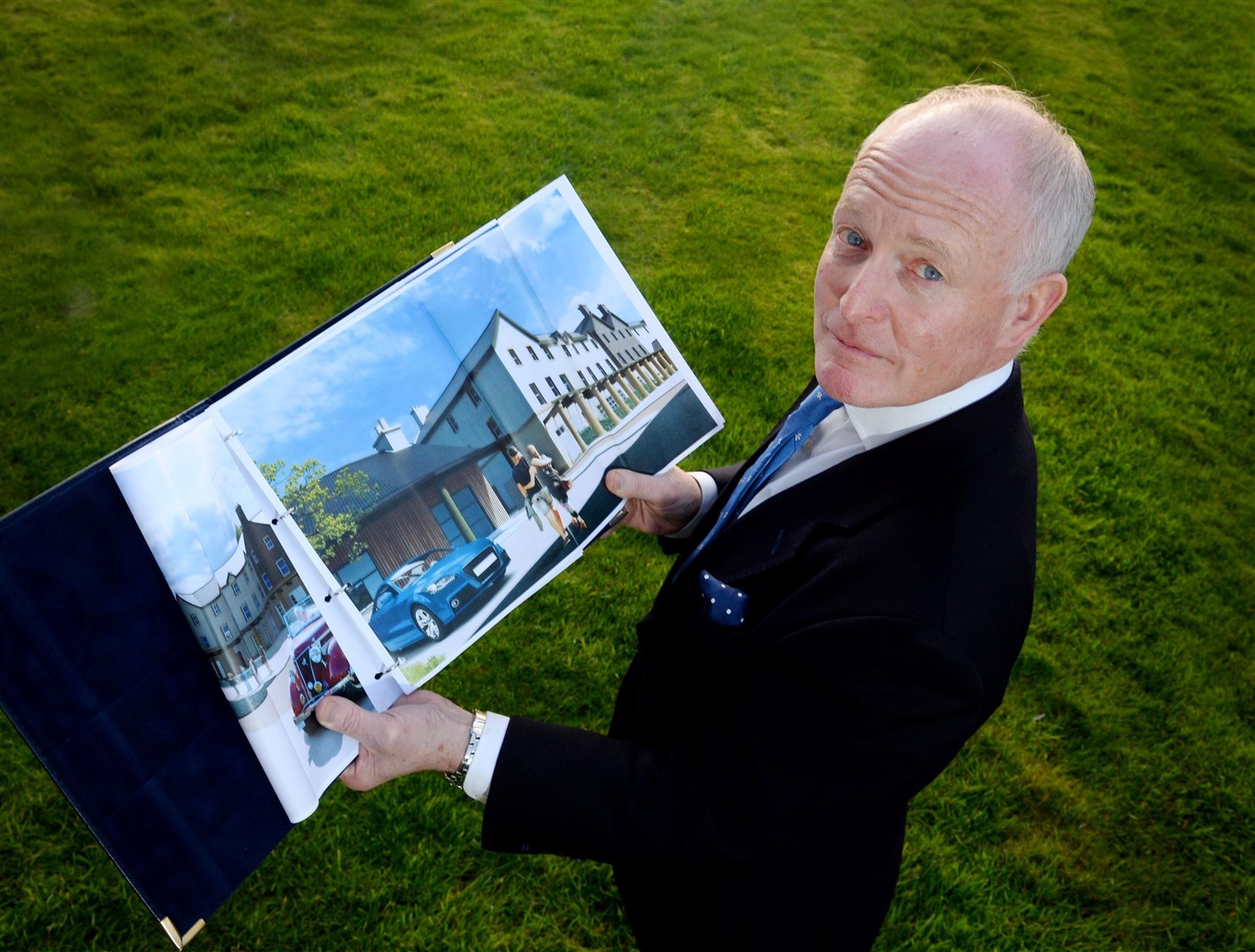 Tomatin Trading Company managing director William Frame with plans for the new development.